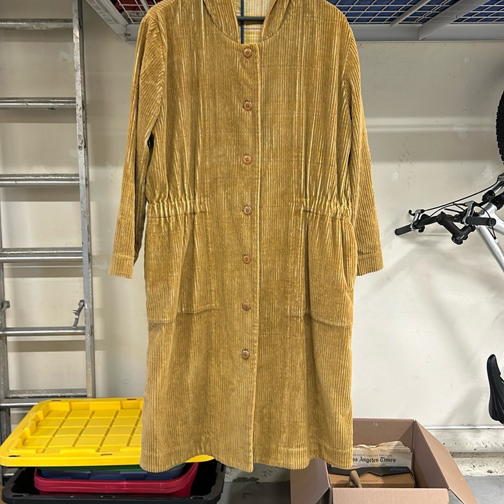 Llana Kohn hooded corduroy coat.